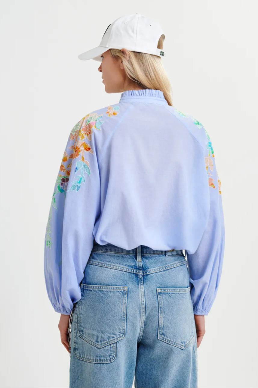 Light blue cotton top with floral embroidery and mandarin collar