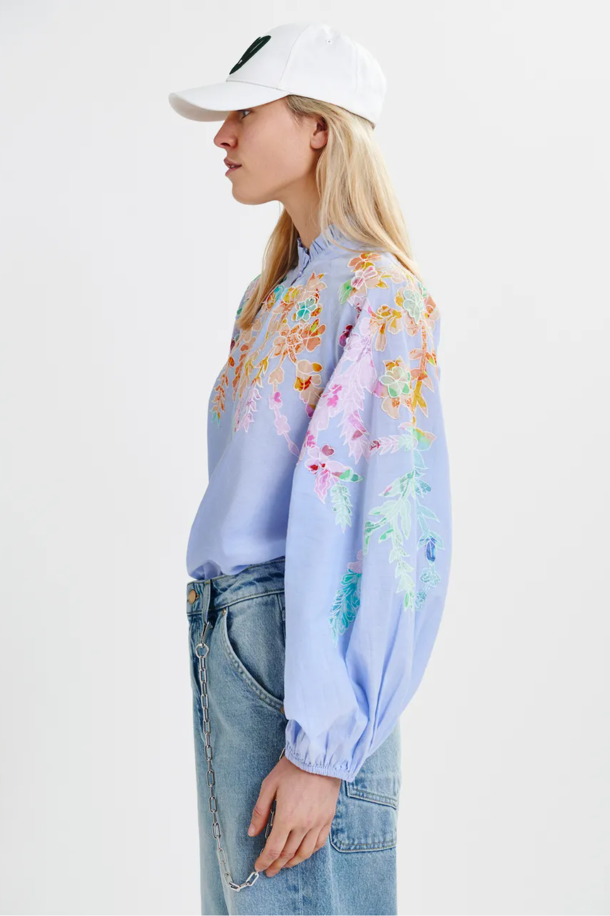 Light blue cotton top with floral embroidery and mandarin collar