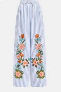 Blue, white and multicolored wide-leg pants with contrast border and embroideries
