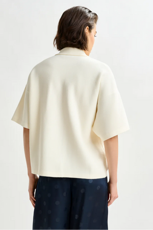 Off-white and grey polo top with bead embellishments