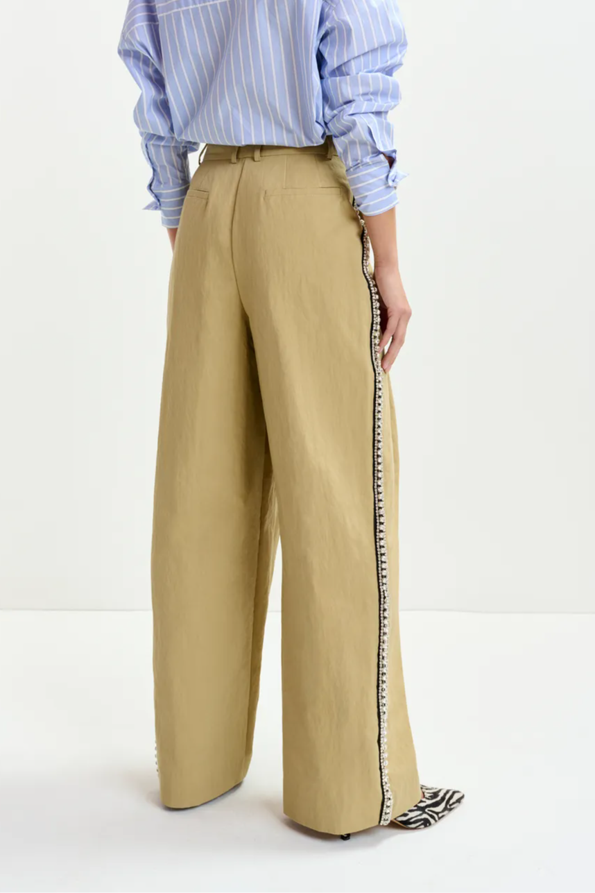 Beige rhinestone-trimmed pleated wide-leg pants