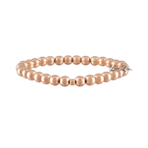 Build Your Own Stack Of Beaded Bracelets Made with Elastic